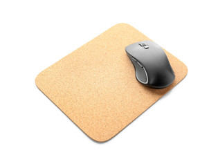 Modern wireless mouse and pad on white background
