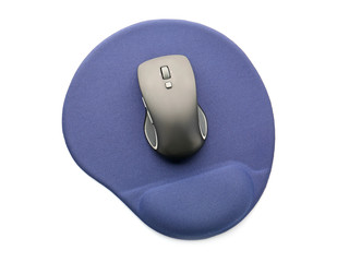Modern wireless mouse and pad on white background