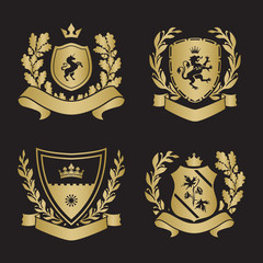Coats of arms - shields with crown, unicorn, laurel wreath at the sides.