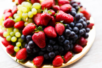 Fruit, berry platter on plate