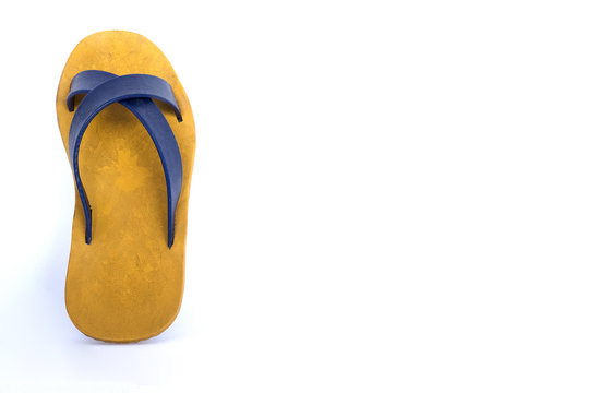 A yellow slipper on white background.