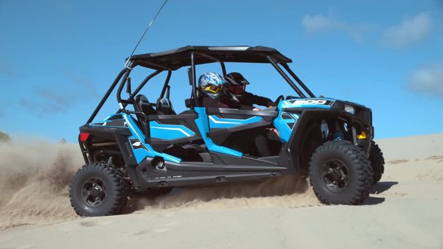 Super slow motion shot of ATV driving on sand dunes, Oregon, shot with Phantom Flex 