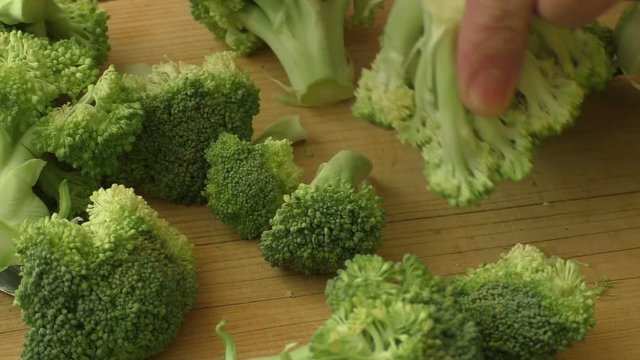Broccoli on a wooden board 
