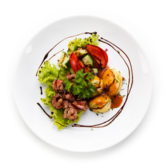 Carpaccio steaks with potatoes on white background