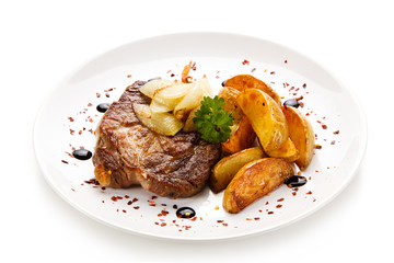 Grilled steak with french fries on white background