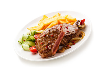 Grilled beefsteak with french fries on white background