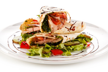 Spring rolls - meat and vegetables on white background