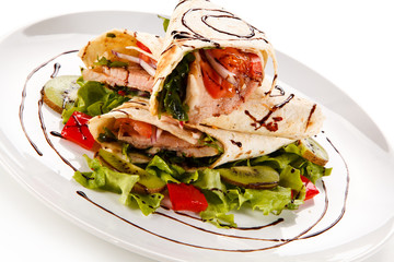 Spring rolls - meat and vegetables on white background