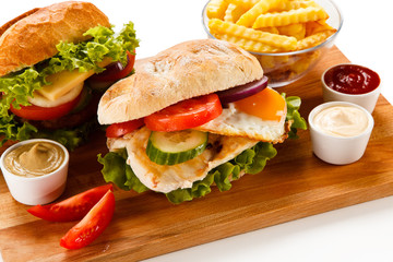 Sandwich with chicken fillet and fried egg