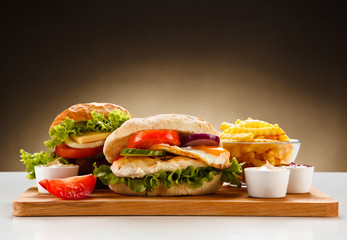 Sandwich with chicken fillet and fried egg