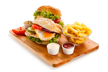 Sandwich with chicken fillet and fried egg