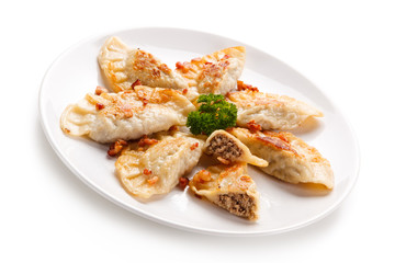 Dumplings - stuffed noodles on white background