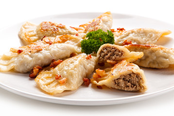 Dumplings - stuffed noodles on white background