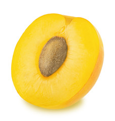 Half of ripe yellow plum isolated
