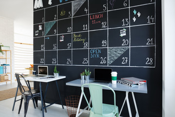 Interior with creative blackboard calendar