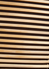 Wooden planks striped wall close-up textured background. Dark and light diagonal lines whitewood contrasting pattern