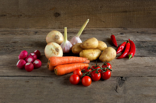  Vegetables on the wood background