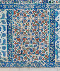  Old ceramic wall tiles with floral blue pattern in an exterior wall of the historic Eyup Sultan Mosque situated in the Eyup district, Istanbul, Turkey