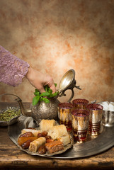 Adding mint to Moroccan tea