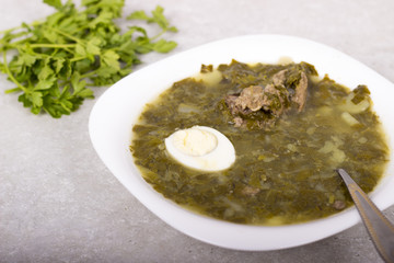 Green borsch with sorrel and boiled eggs