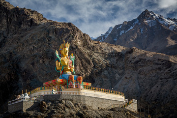 Colourful sculpture of giant Maitreya Buddha at Diskit monastery in Nubra valley in the Indian...