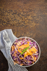 Cabbage and carrot salad with yogurt dressing. 