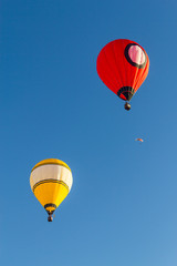 Hot air balloons and paraglider