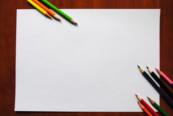 Colored pencils and paper