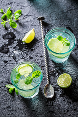 Refreshing and cold Mojito with ice and alcohol