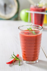 Homemade cocktail with tomatoes and chilli peppers