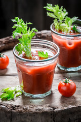 Salty bloody mary cocktail with fresh tomatoes