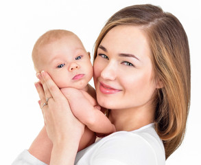 Mother and baby playing and smiling. Happy family.
