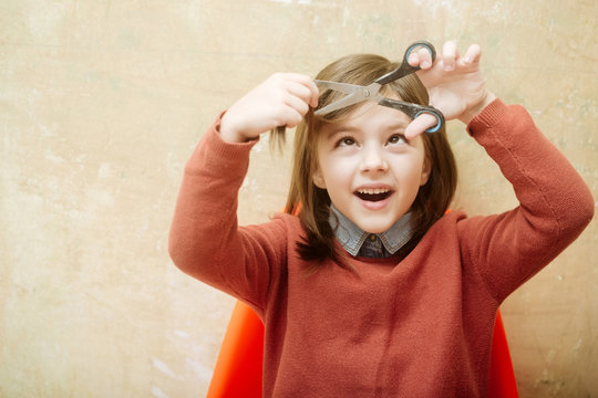 Cheerful Girl, Hairdresser, Cutting Long Hair With Scissors Over Head