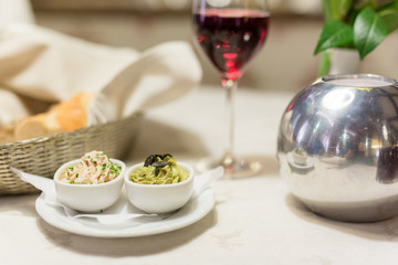Amuse gaule two spreads with red wine