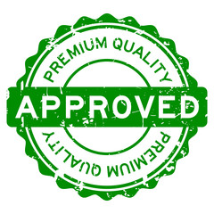 Grunge green premium quality approved round rubber seal stamp on white background