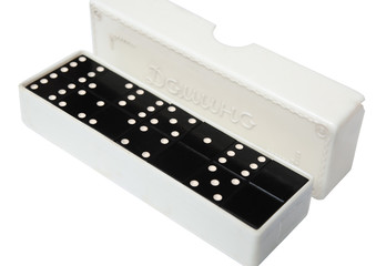 Old Soviet dominoes in plastic box isolated on white background. The inscription on the cover, translated from the Russian language indicates the name of the game 