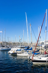 Obraz premium Street view of Barcelona harbor with boats, Spain Europe