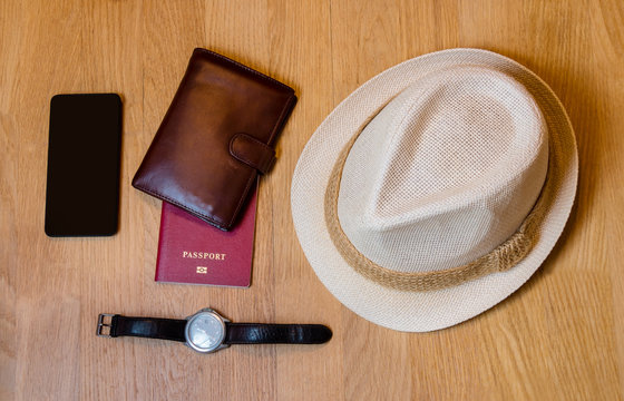 Travel accessories. Hat, wallet, passport  prepared for the trip