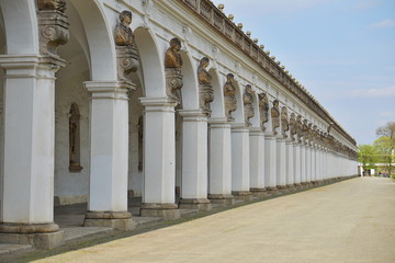 Fototapeta premium Famous Unesco gardens in Kromeriz town (in Czech Republic) with its green gardens in symmetrical pattern and decorated chateau