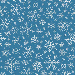 Christmas seamless doodle pattern with snowflakes