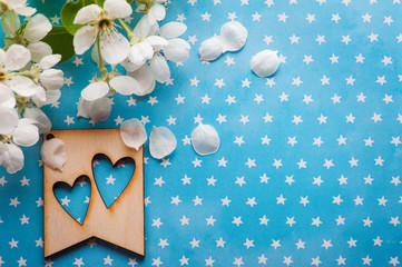 Wooden tag with hearts on blue