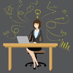 Business woman or office worker sitting at the computer
