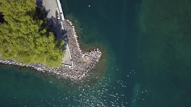 Nature and City, Aerial Top View Shot of Ouchy Waterfront in Lausanne, Switzerland, Boats near Pier