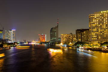 Fototapeta na wymiar Chao Phraya River view from Taksin Bridge in night time