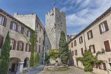 Fototapeta na wymiar Inner courtyard of the castle Duino with old tower in the middle