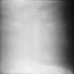 blurry unfocused background with light leaks and grain