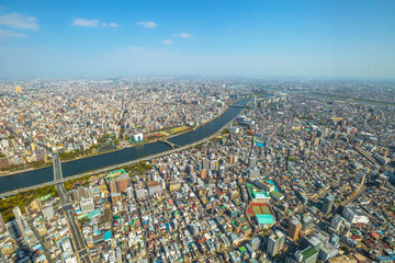 Aerial view of Tokyo city skyline, Sumida River Bridges and Asakusa area from Tokyo Skytree observatory. Daytime. Tokyo, Japan.