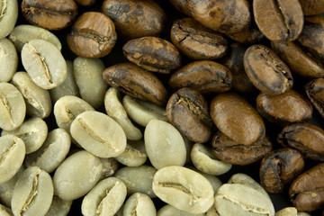 Green and black coffee. Macro photo.