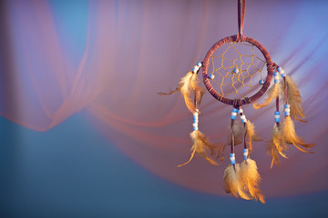 dreamcatcher on a color background