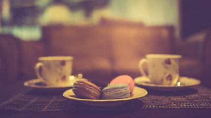 Afternoon tea time with delicious colorful macarons 